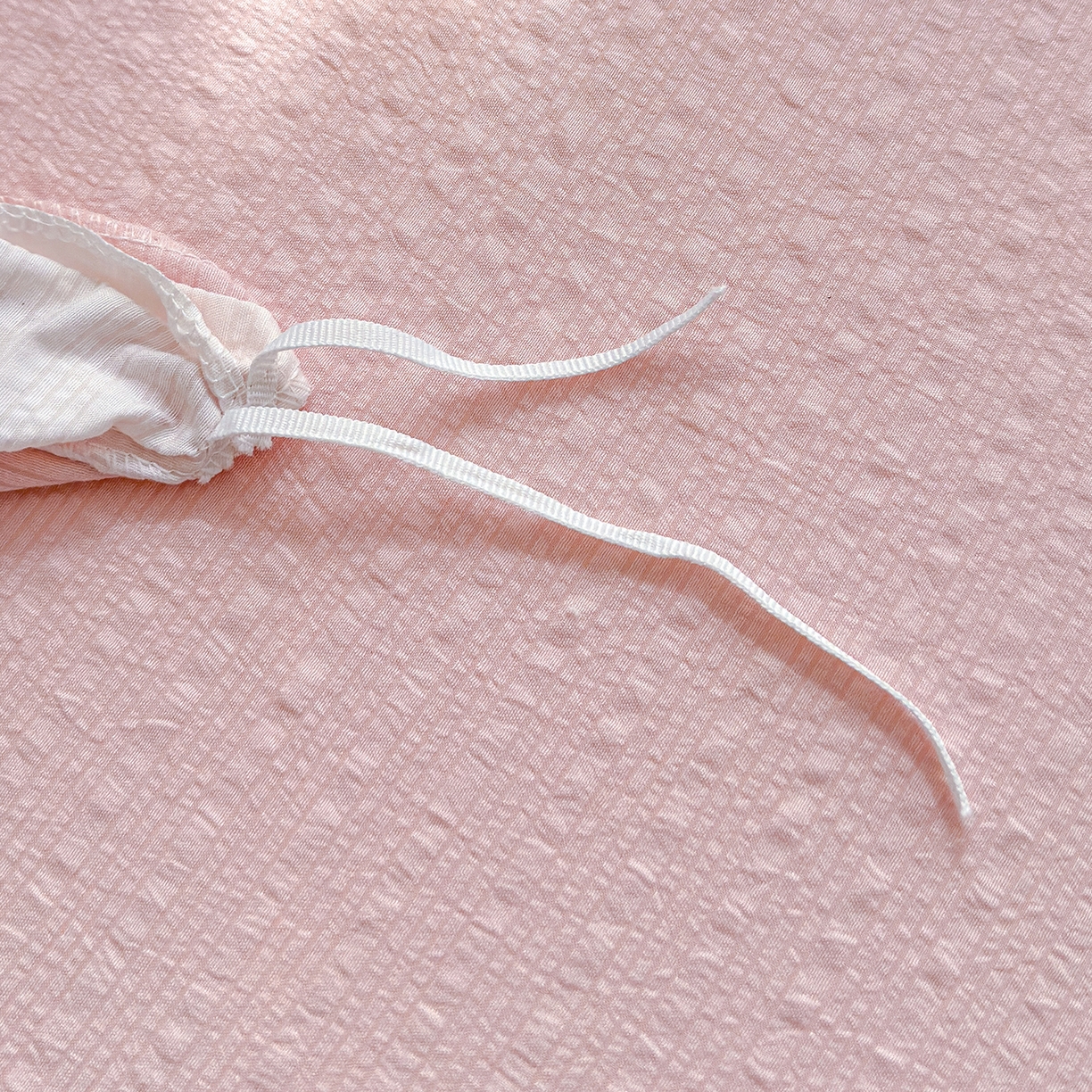 91家纺网 家纺一手货源 找家纺 竹合家纺 2026春夏新品高克重A类泡芙纱泡泡皱皱纱四件套 约定一粉