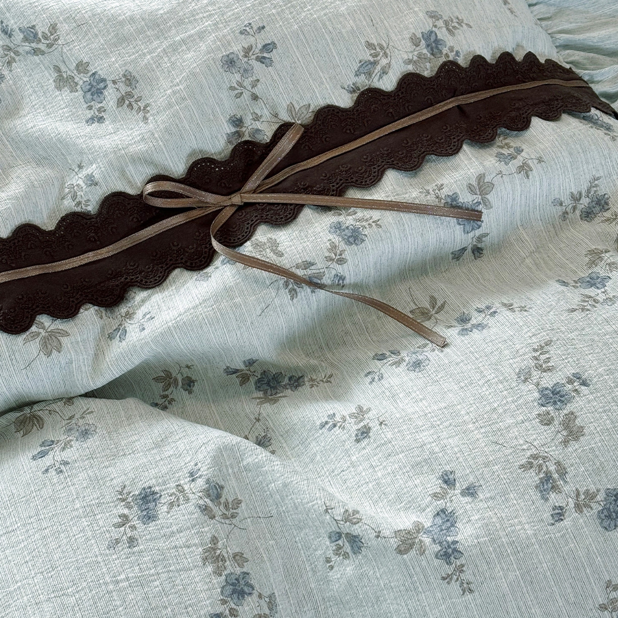 91家纺网 家纺一手货源 找家纺 迷尚家居 2026新款提花色织麻花边四件套 小兰花绿