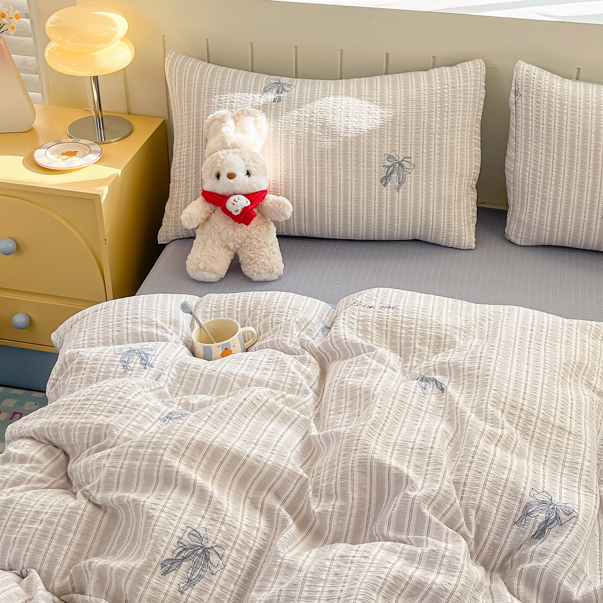 91家纺网 家纺一手货源 找家纺 金梦拉家纺 2026新款A类高品质高克重超柔泡芙纱泡泡纱小清新四件套 蝴蝶结兰