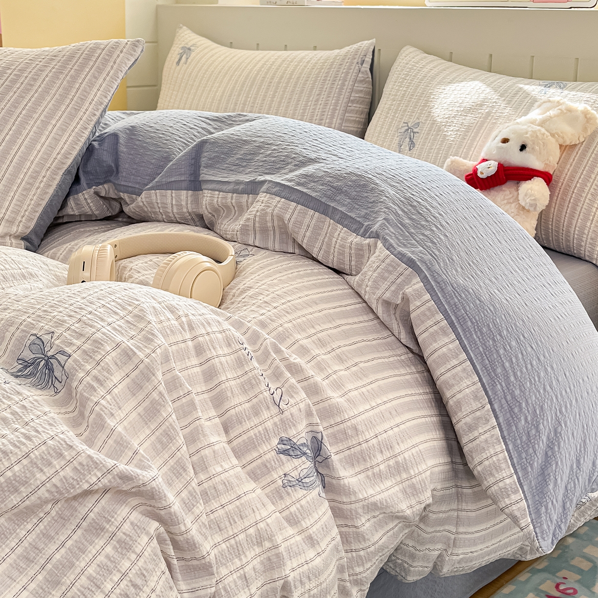 91家纺网 家纺一手货源 找家纺 金梦拉家纺 2026新款A类高品质高克重超柔泡芙纱泡泡纱小清新四件套 蝴蝶结兰