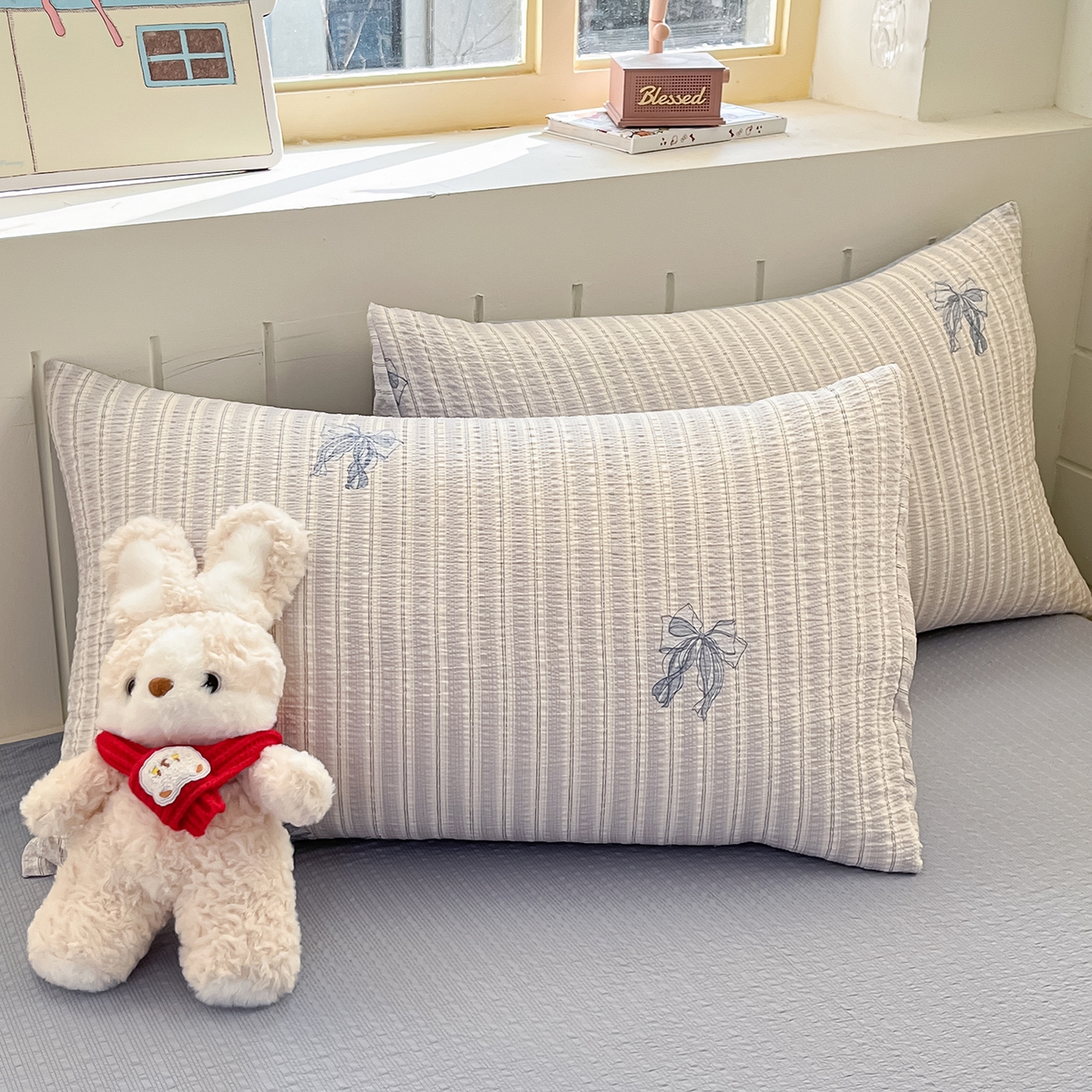 91家纺网 家纺一手货源 找家纺 金梦拉家纺 2026新款A类高品质高克重超柔泡芙纱泡泡纱小清新四件套 蝴蝶结兰