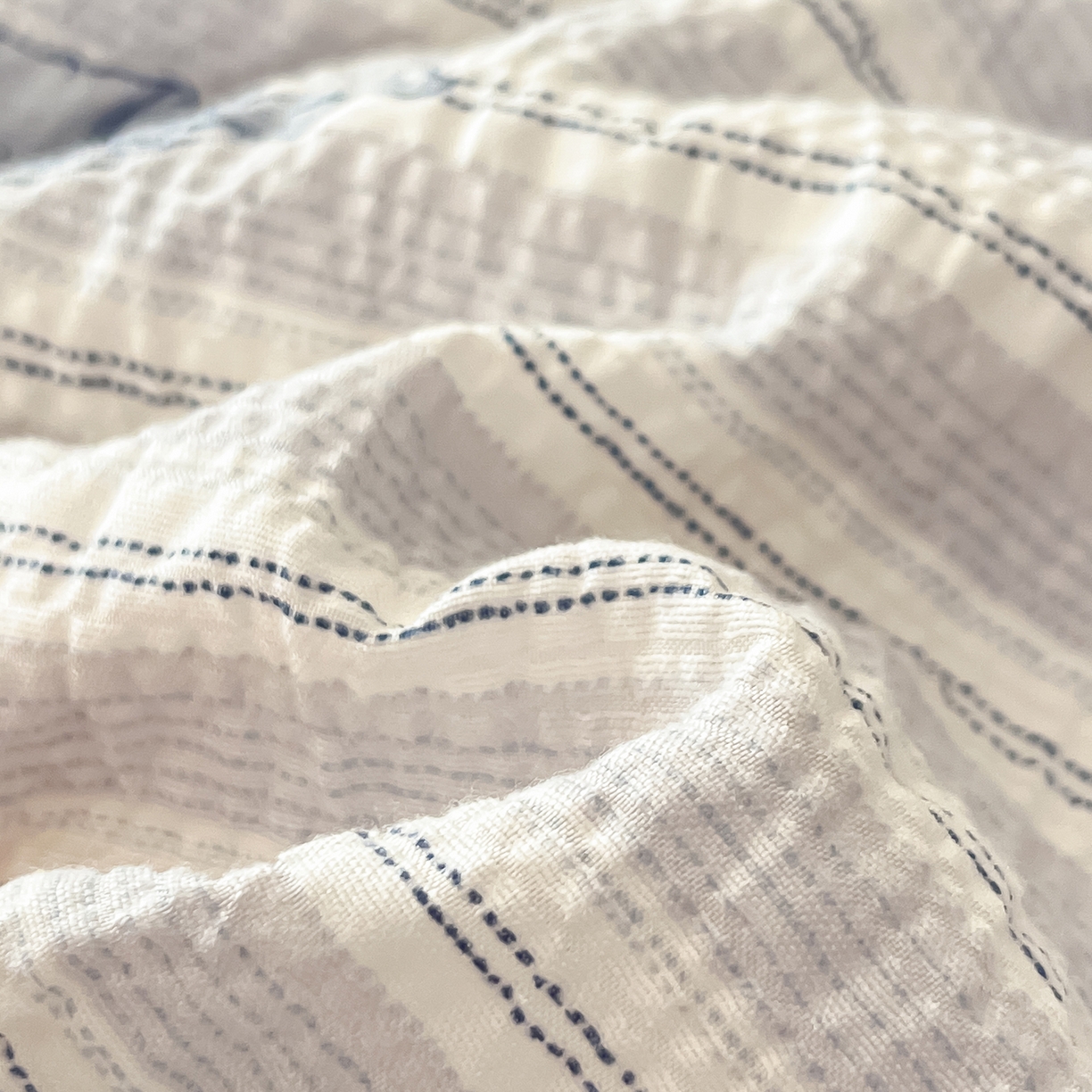 91家纺网 家纺一手货源 找家纺 金梦拉家纺 2026新款A类高品质高克重超柔泡芙纱泡泡纱小清新四件套 蝴蝶结兰