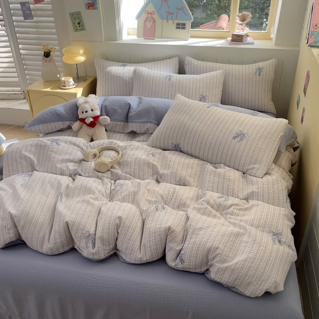 91家纺网 家纺一手货源 找家纺 金梦拉家纺 2026新款A类高品质高克重超柔泡芙纱泡泡纱小清新四件套 蝴蝶结兰