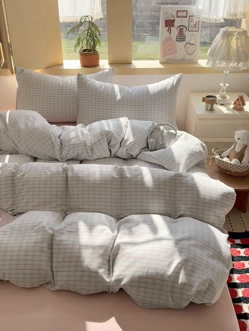 91家纺网 家纺一手货源 找家纺 爱思佳 2026新款全棉双层纱混搭格子系列四件套 追光-粉