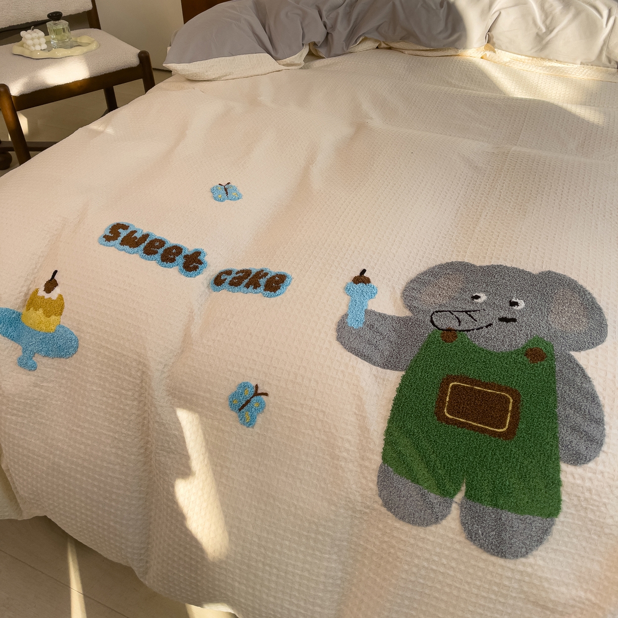 91家纺网 家纺一手货源 找家纺 炫拼家纺 2026新款A类全棉色织华夫格卡通毛巾绣B版40支纯棉水洗棉四件套-乐邦系列 乐邦-甜筒象