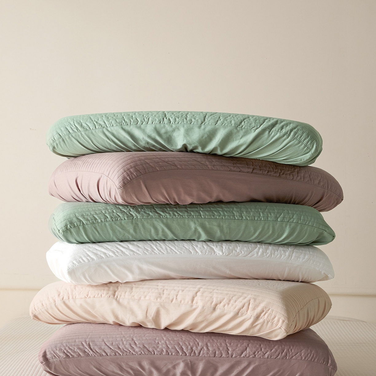 91家纺网 家纺一手货源 找家纺 衿成家纺 2026新款13372 全棉橡皮筋魔术万能夹棉枕套  适用多种枕头 组合（仅参考）