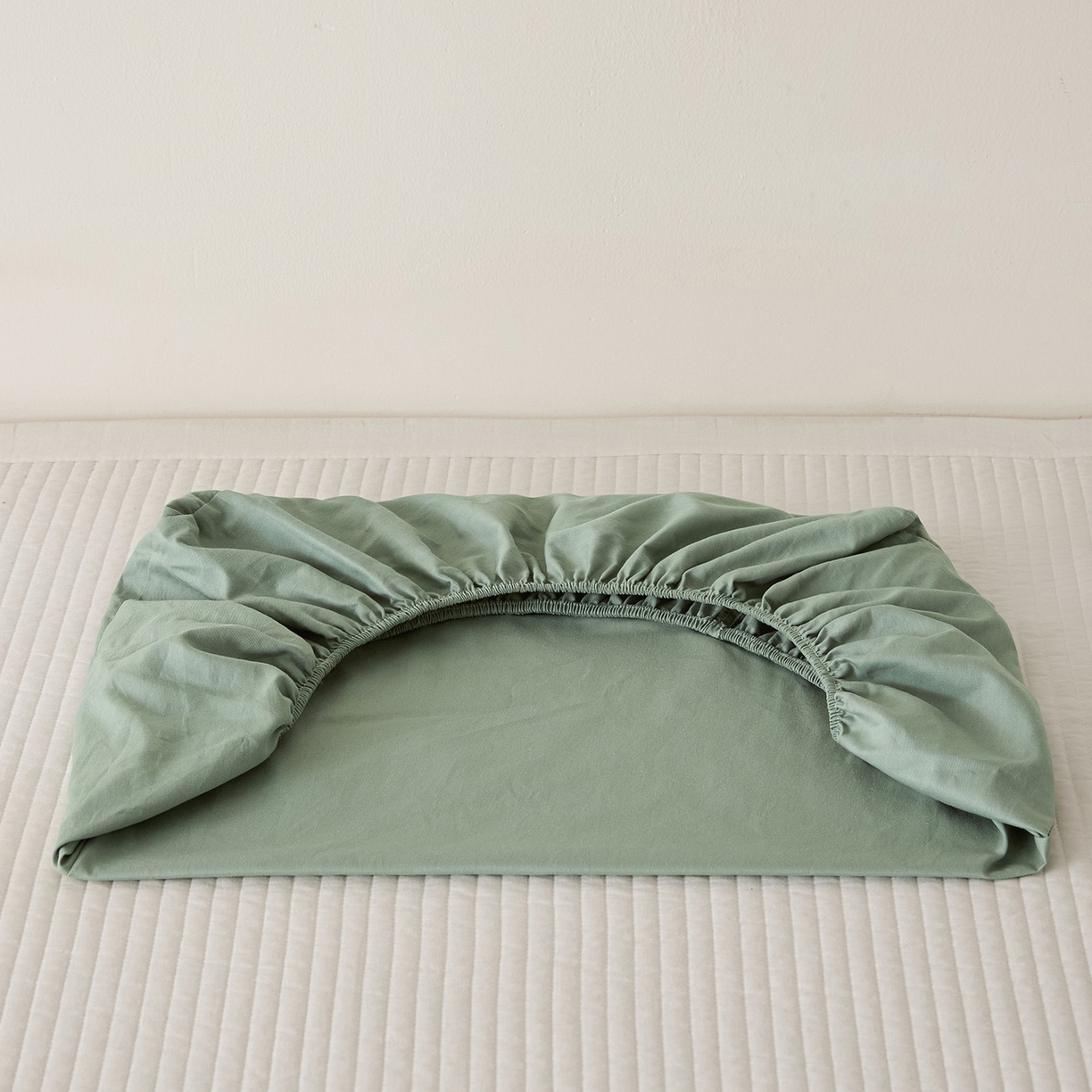 91家纺网 家纺一手货源 找家纺 衿成家纺 2026新款13372 全棉橡皮筋魔术万能单层枕套  适用多种枕头 XP-绿色