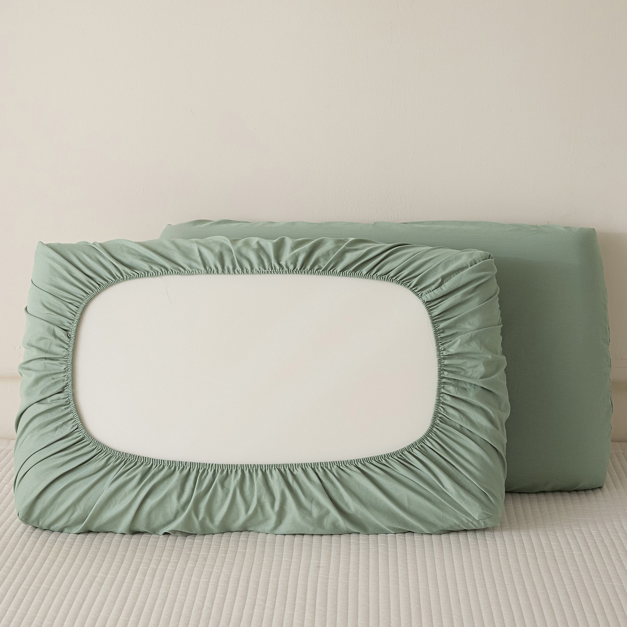 91家纺网 家纺一手货源 找家纺 衿成家纺 2026新款13372 全棉橡皮筋魔术万能单层枕套  适用多种枕头 XP-绿色