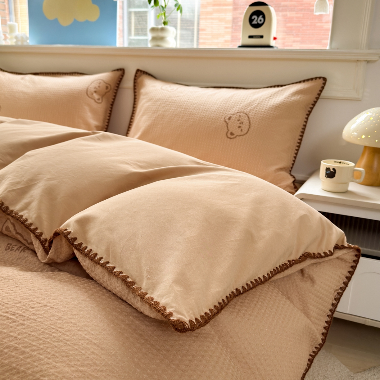 91家纺网 家纺一手货源 找家纺 雯雨家纺 2026新款A类全棉华夫格提花贝壳边工艺四件套 萌动时光咖