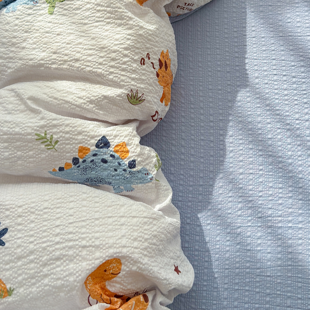 91家纺网 家纺一手货源 找家纺 铺尚美家纺 2026春夏新品高克重A类泡芙纱泡泡皱皱纱四件套 侏罗纪