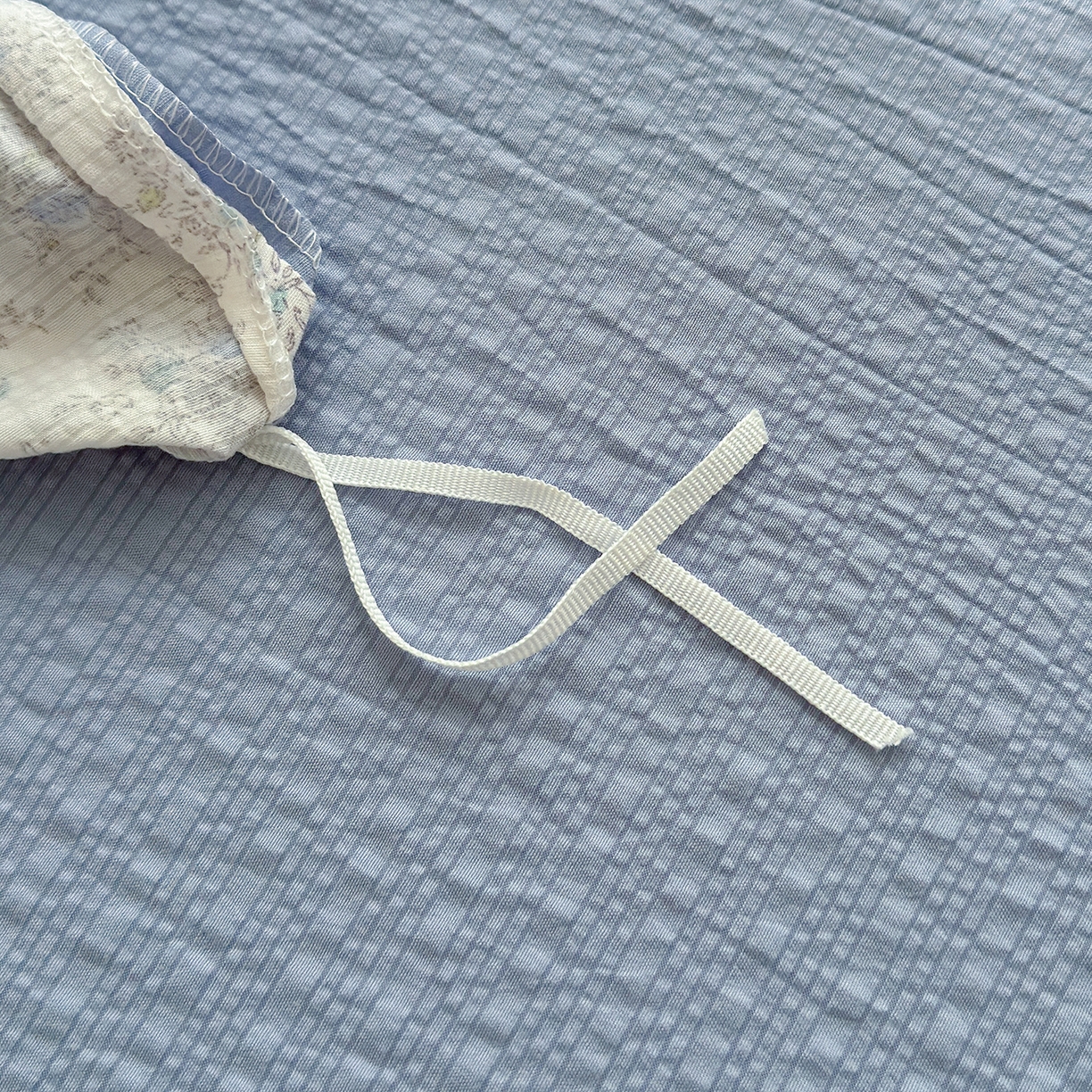 91家纺网 家纺一手货源 找家纺 铺尚美家纺 2026春夏新品高克重A类泡芙纱泡泡皱皱纱四件套 花中小熊