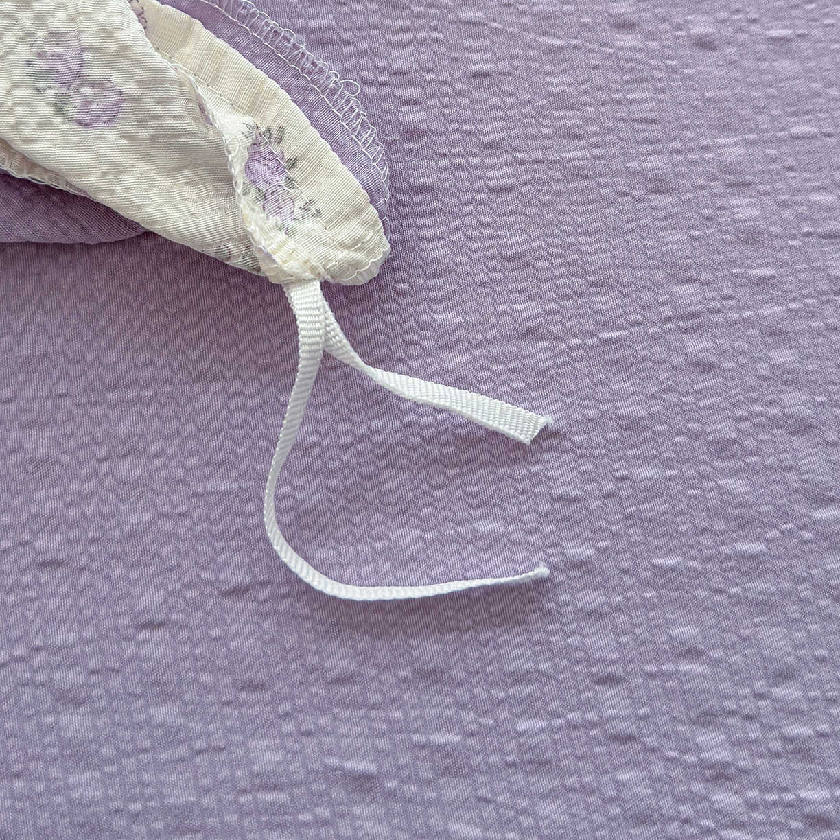 91家纺网 家纺一手货源 找家纺 铺尚美家纺 2026春夏新品高克重A类泡芙纱泡泡皱皱纱四件套 紫色花园