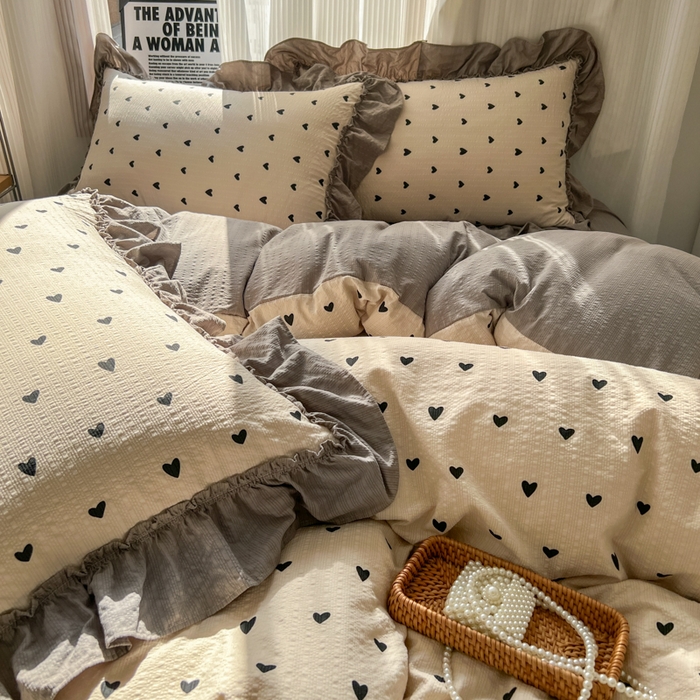 91家纺网 家纺一手货源 找家纺 2026新款泡芙纱花边四件套 咖爱心