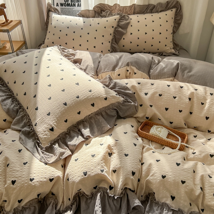 91家纺网 家纺一手货源 找家纺 2026新款泡芙纱花边四件套 咖爱心