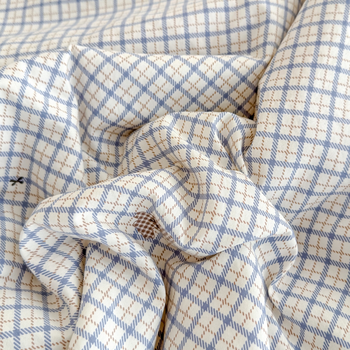 91家纺网 家纺一手货源 找家纺 归属 2026春夏新款古法仿棉床盖夏被四件套夏凉被空调被系列 格子兔儿