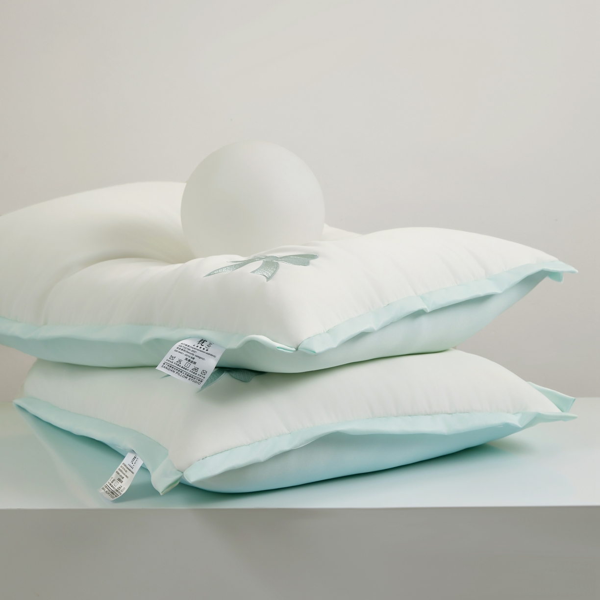 91家纺网 家纺一手货源 找家纺 （总）小桃姐家纺 2025新款夏季凉感天丝蝴蝶结枕头枕芯少女心可爱刺绣枕芯