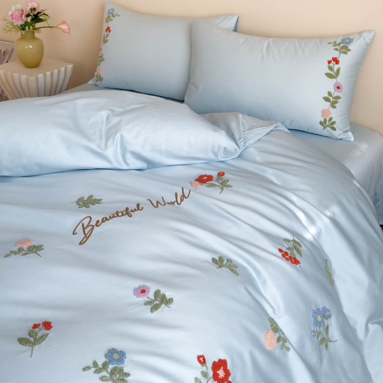 91家纺网 家纺一手货源 找家纺 优彩 2026春夏新款A类100支长绒棉毛巾绣四件套系列 醉花阴-蓝