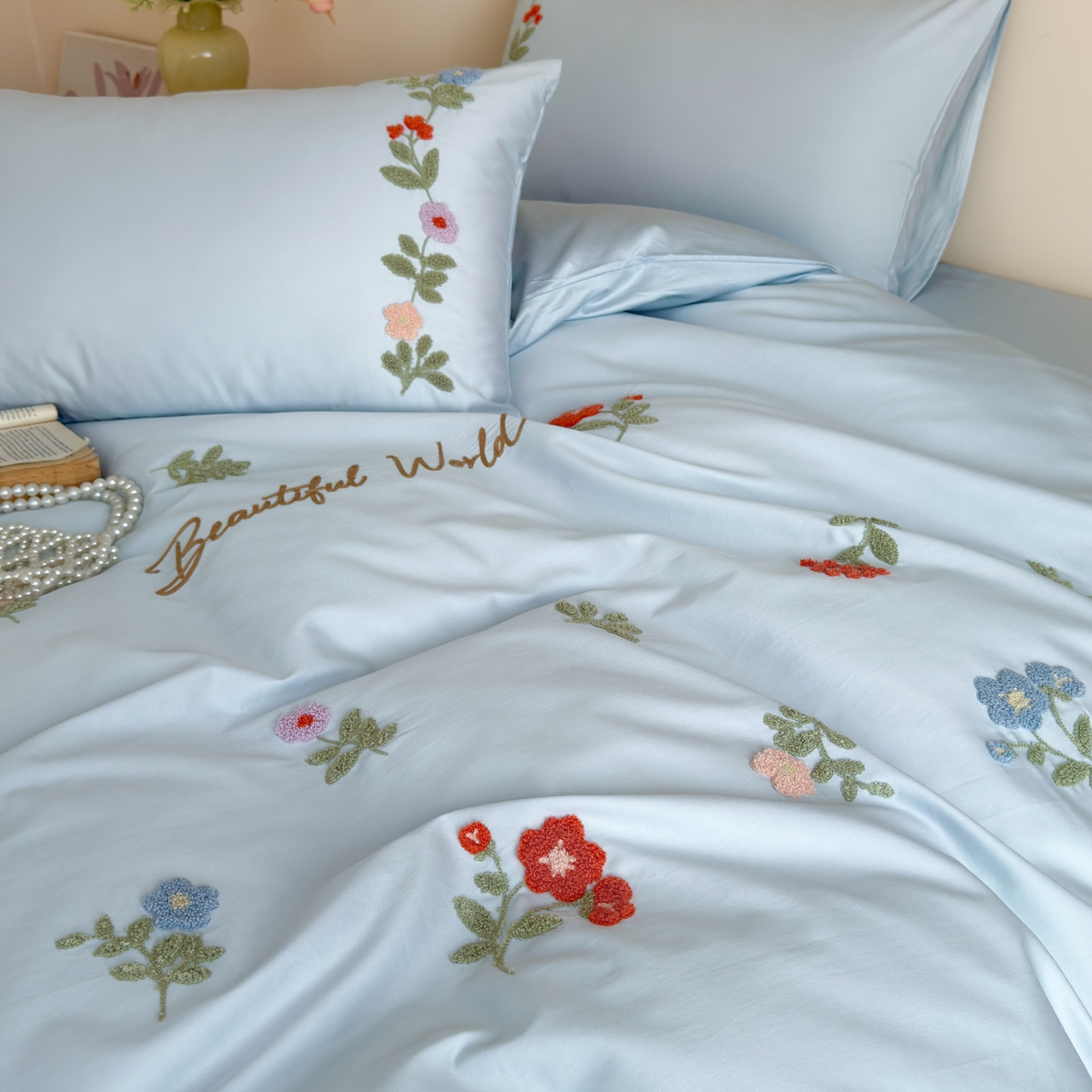 91家纺网 家纺一手货源 找家纺 优彩 2026春夏新款A类100支长绒棉毛巾绣四件套系列 醉花阴-蓝