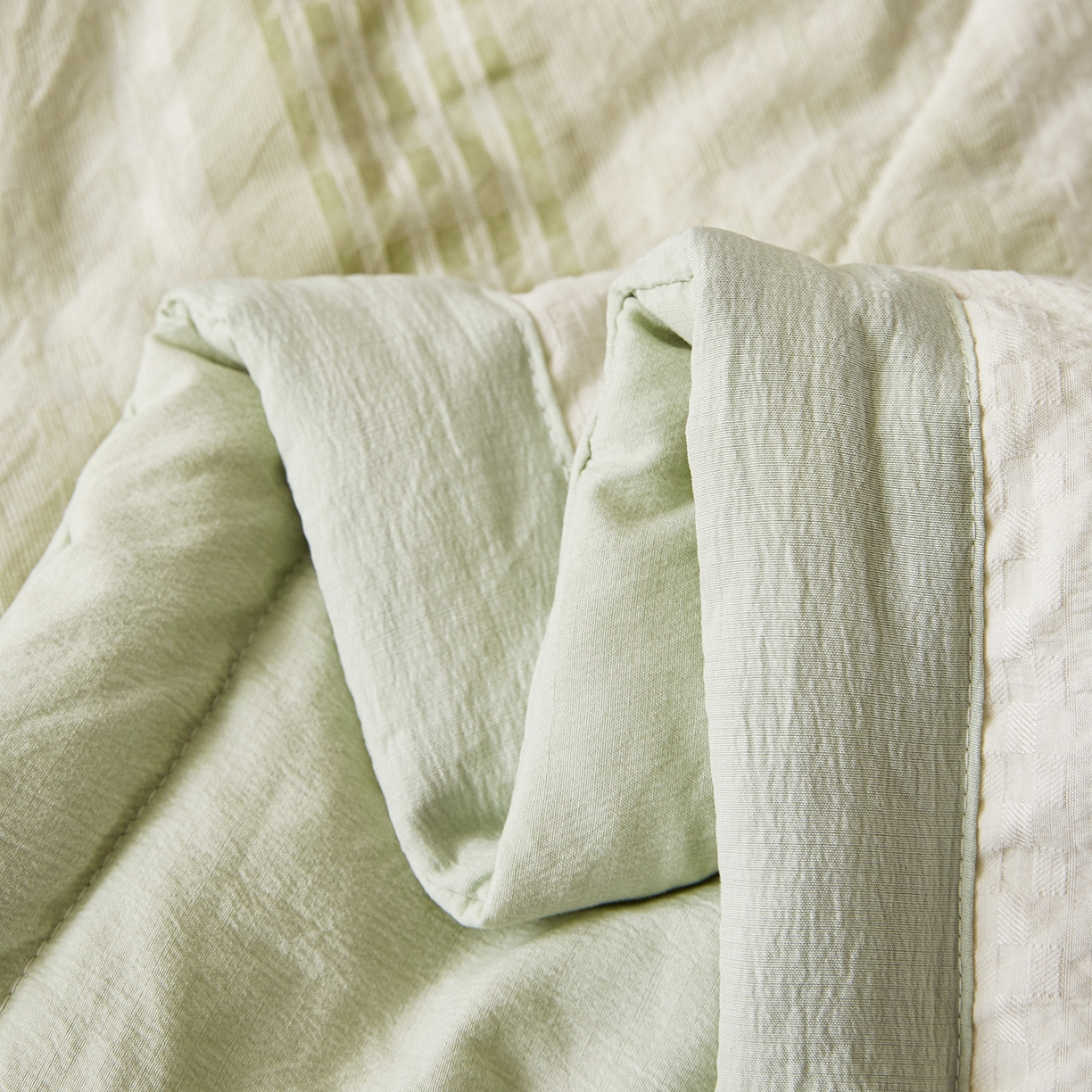 91家纺网 家纺一手货源 找家纺 心悦家纺 2026新款日式A类水洗色织提花大豆纤维被子被芯 织雅-绿色