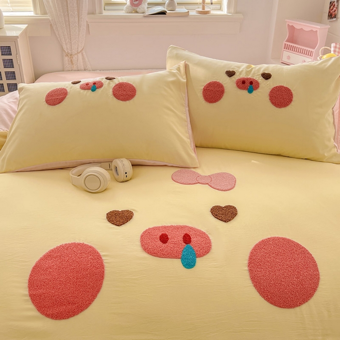 91家纺网 家纺一手货源 找家纺 颜选 2026春夏新款卡通款水洗棉毛巾绣四件套-猪猪 猪猪女孩-黄