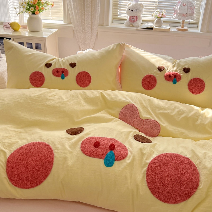 91家纺网 家纺一手货源 找家纺 颜选 2026春夏新款卡通款水洗棉毛巾绣四件套-猪猪 猪猪女孩-黄