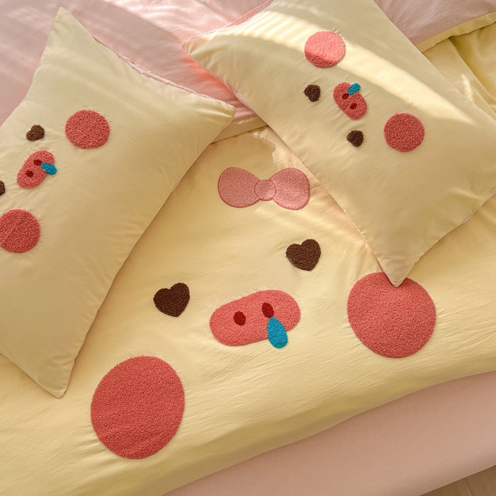 91家纺网 家纺一手货源 找家纺 颜选 2026春夏新款卡通款水洗棉毛巾绣四件套-猪猪 猪猪女孩-黄