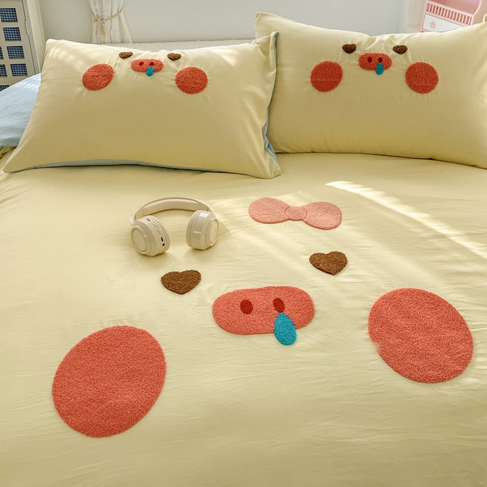 91家纺网 家纺一手货源 找家纺 颜选 2026春夏新款卡通款水洗棉毛巾绣四件套-猪猪 猪猪女孩-黄+蓝