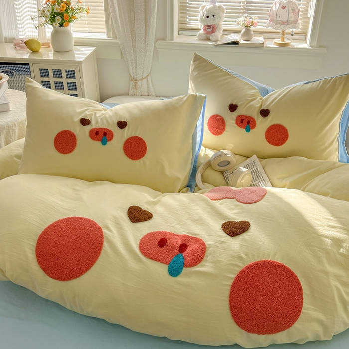 91家纺网 家纺一手货源 找家纺 颜选 2026春夏新款卡通款水洗棉毛巾绣四件套-猪猪 猪猪女孩-黄+蓝