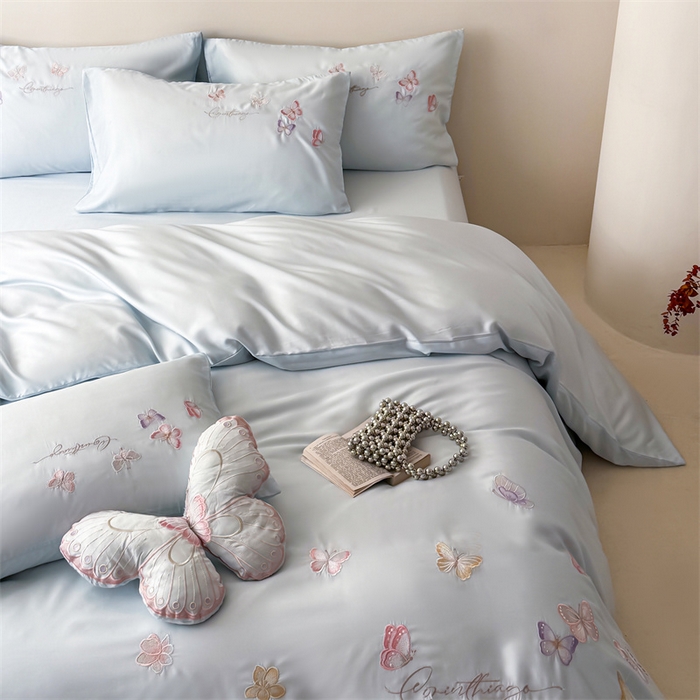 91家纺网 家纺一手货源 找家纺 绒棉世家 2026新款100%莱赛尔天丝面料刺绣四件套-蝶引系列 蝶引-蓝