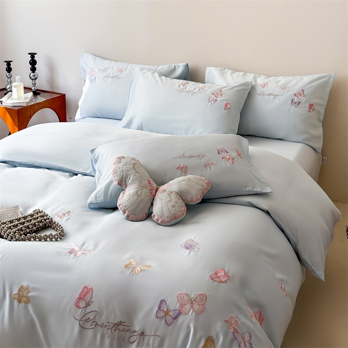 91家纺网 家纺一手货源 找家纺 绒棉世家 2026新款100%莱赛尔天丝面料刺绣四件套-蝶引系列 蝶引-蓝