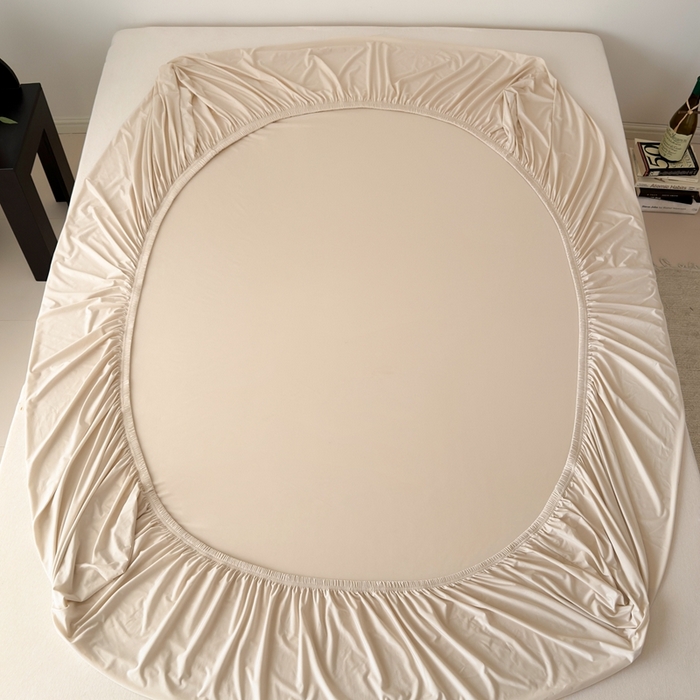 91家纺网 家纺一手货源 找家纺 法芙娜家纺 2026新款纯色165克双面锦氨凉感冰皮床笠 杏色