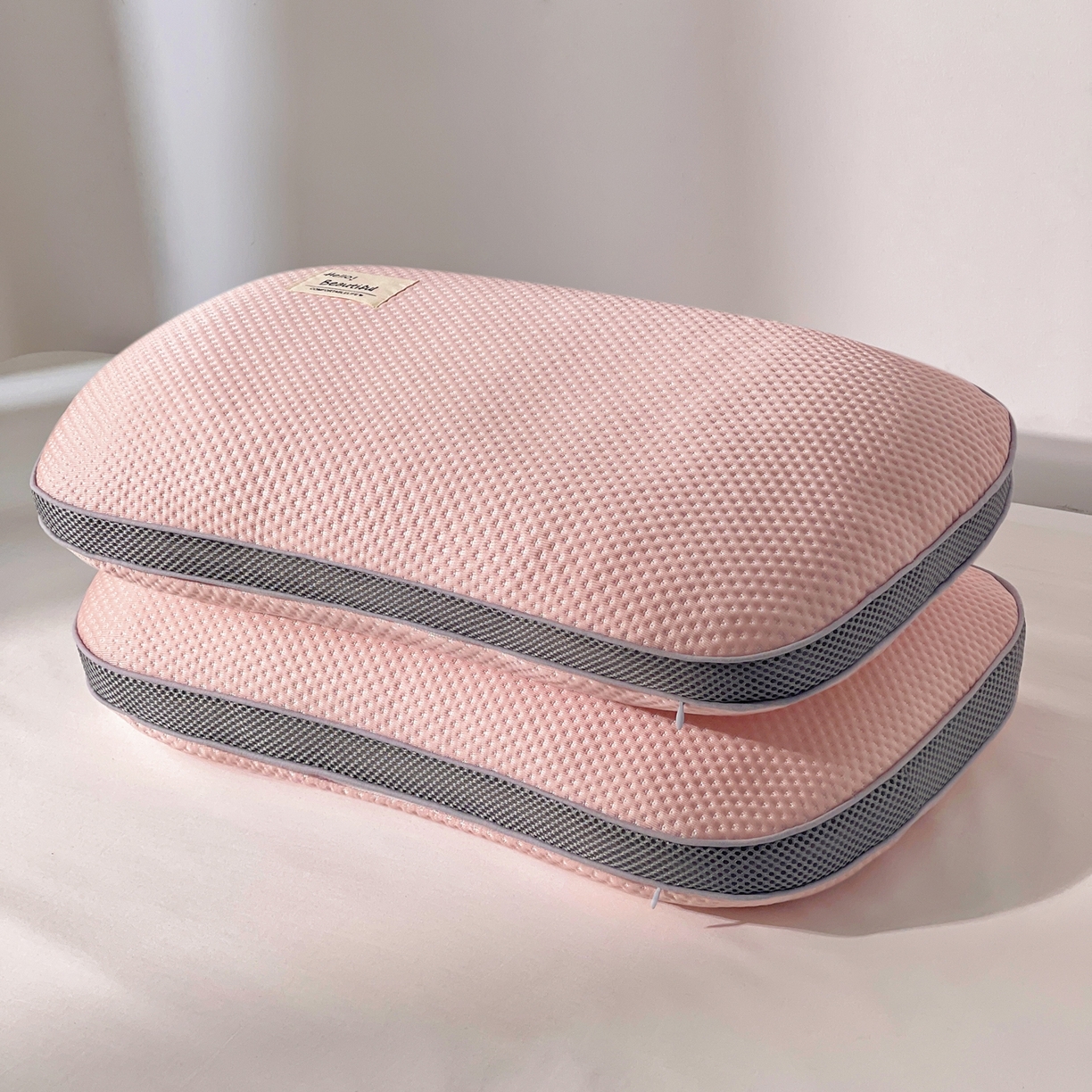 91家纺网 家纺一手货源 找家纺 小桃姐家纺 2025新款凉感冰丝枕荞麦枕头凉豆豆纯色透气面包枕头枕芯 粉色