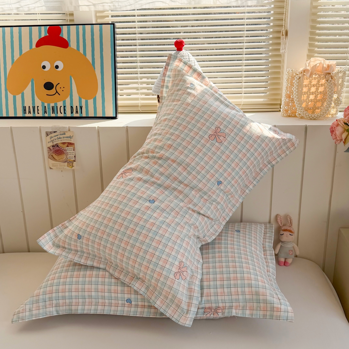 91家纺网 家纺一手货源 找家纺 百寐 2026新款13372全棉信封印花系列枕套 蝴蝶结