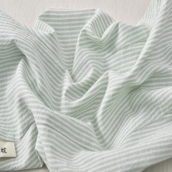 91家纺网 家纺一手货源 找家纺 小桃姐家纺 2025新款全棉纯棉条纹日式无印风荞麦枕三角大凉山荞麦枕 花草枕 颈椎枕 护颈枕 沙发枕 午休枕头 全棉苦荞三角枕-条纹绿
