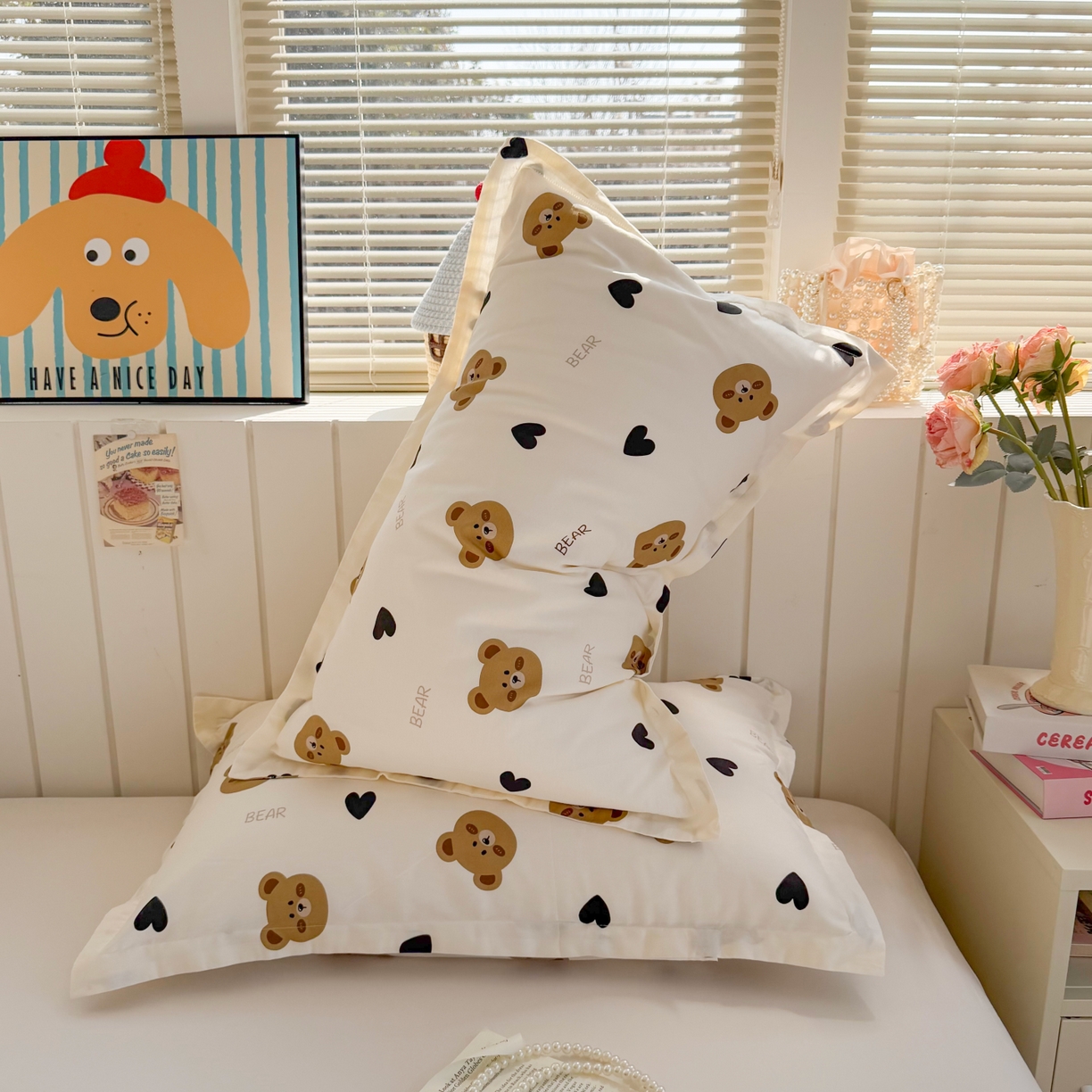 91家纺网 家纺一手货源 找家纺 百寐 2026新款13372全棉信封印花系列枕套 心心熊