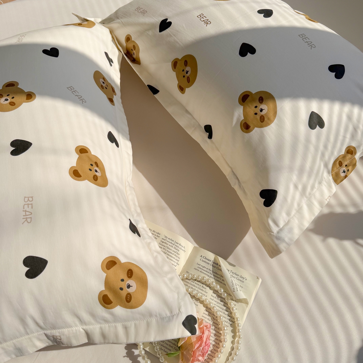 91家纺网 家纺一手货源 找家纺 百寐 2026新款13372全棉信封印花系列枕套 心心熊