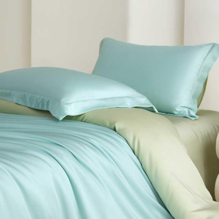 91家纺网 家纺一手货源 找家纺 禧澜庭 2026新款纯色夏季凉感天丝四件套莱赛尔纤维冰丝四件套 云蓝若草