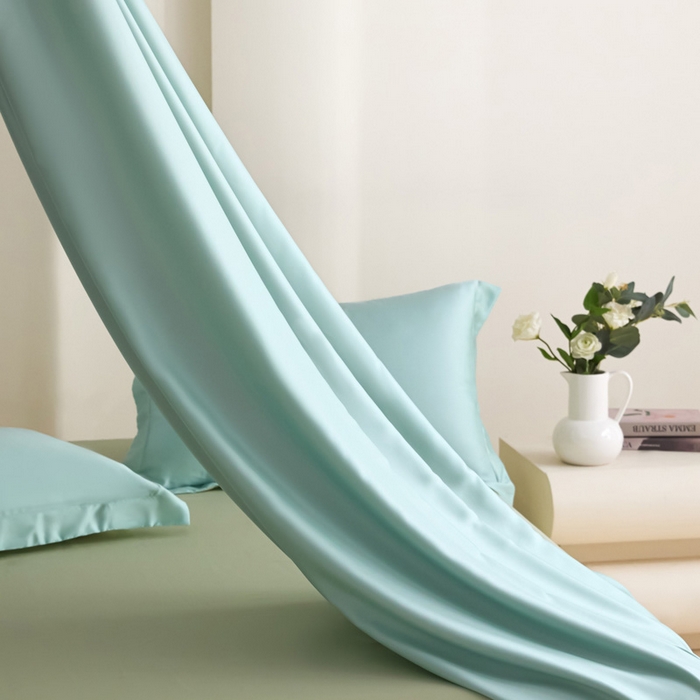 91家纺网 家纺一手货源 找家纺 禧澜庭 2026新款纯色夏季凉感天丝四件套莱赛尔纤维冰丝四件套 云蓝若草