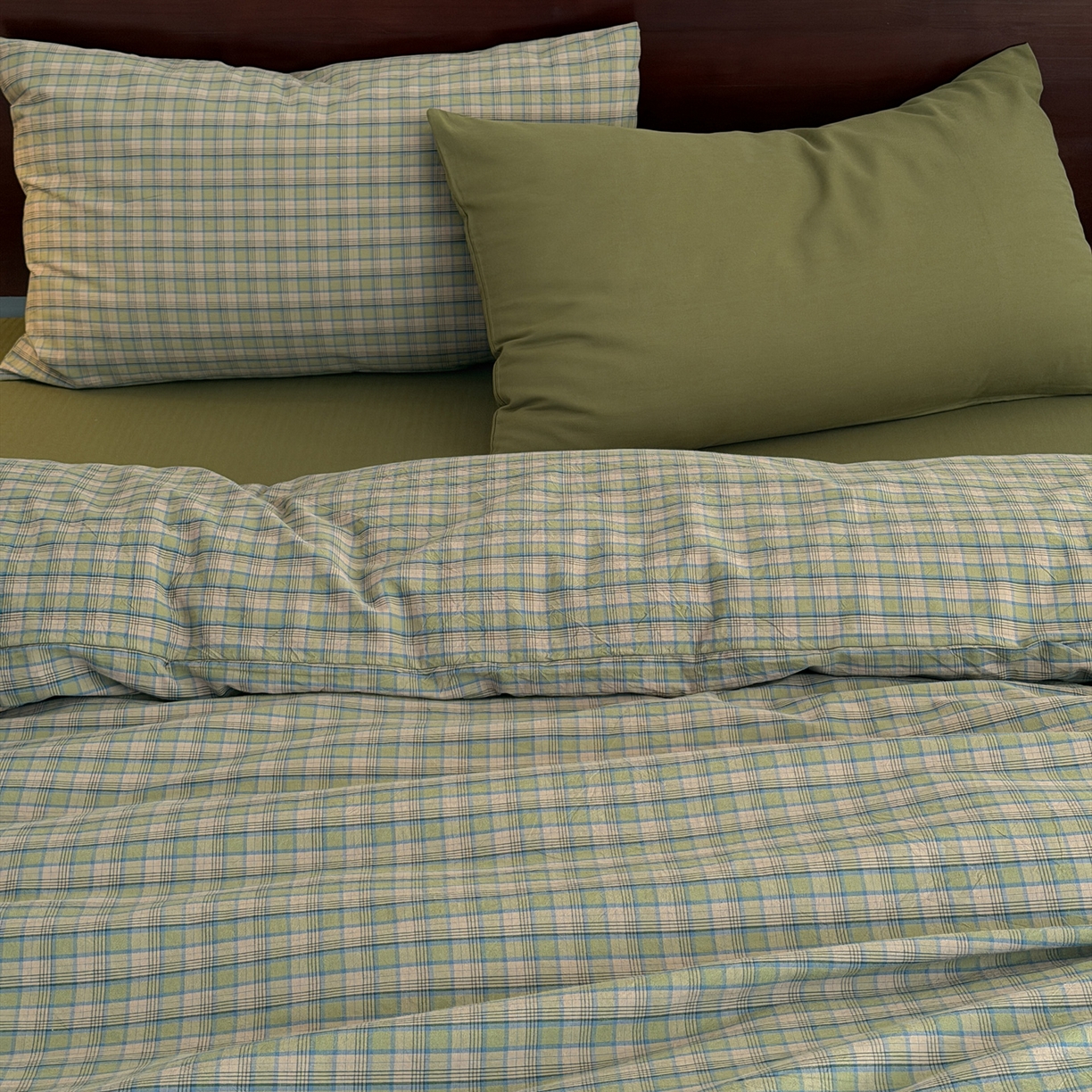 91家纺网 家纺一手货源 找家纺 玖弘家居 2026新款全棉色织水洗棉人字纹格子混搭四件套系列 复古绿格+橄榄绿