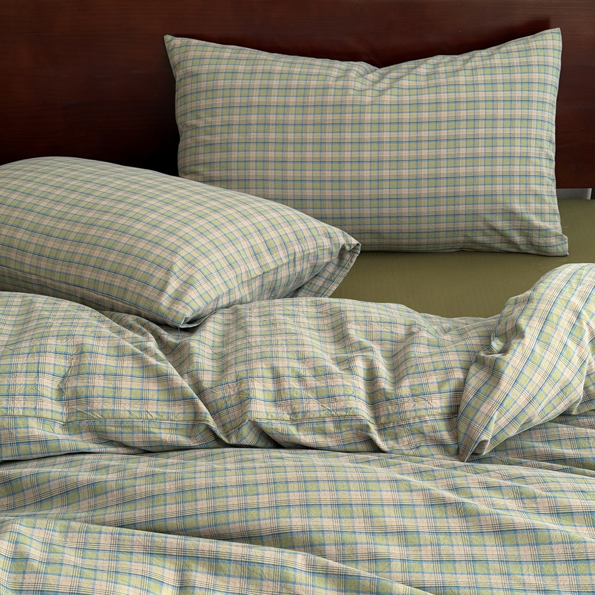 91家纺网 家纺一手货源 找家纺 玖弘家居 2026新款全棉色织水洗棉人字纹格子混搭四件套系列 复古绿格一对