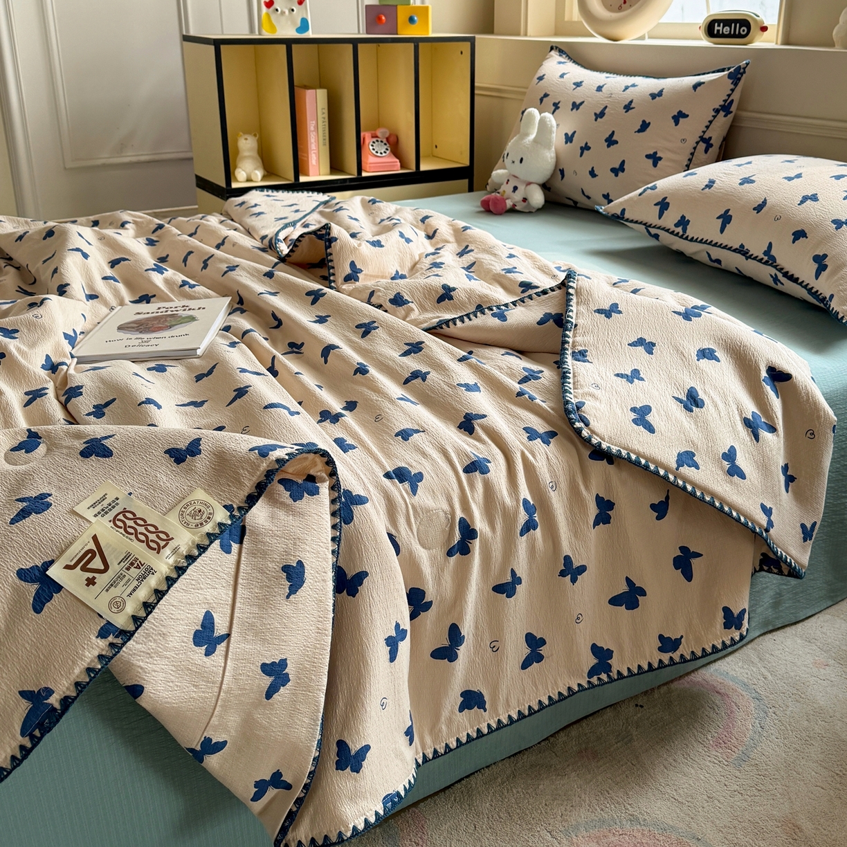 91家纺网 家纺一手货源 找家纺 2026新款春夏云感双层纱母婴级三角针夏被贝壳边夏凉被贝壳绣 蝴蝶剪影