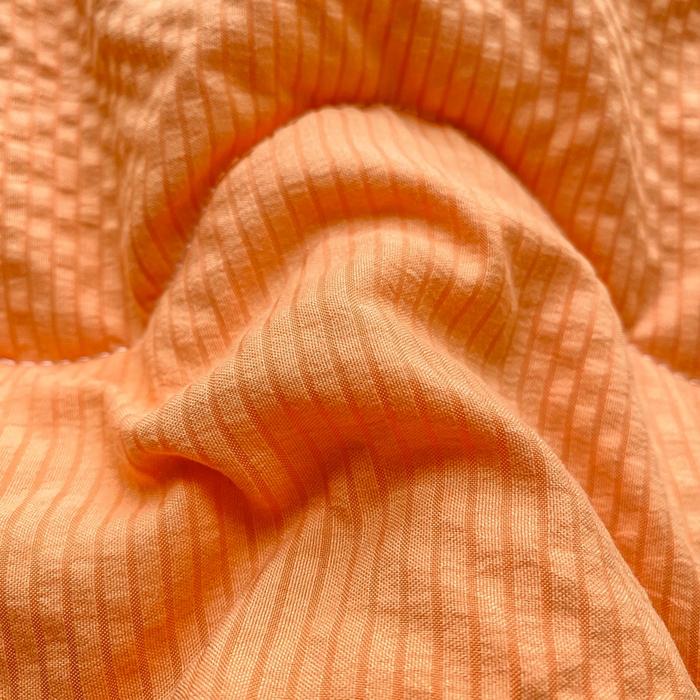 91家纺网 家纺一手货源 找家纺 麒东家纺 2026新款春夏泡泡纱夹棉床垫系列 橙色