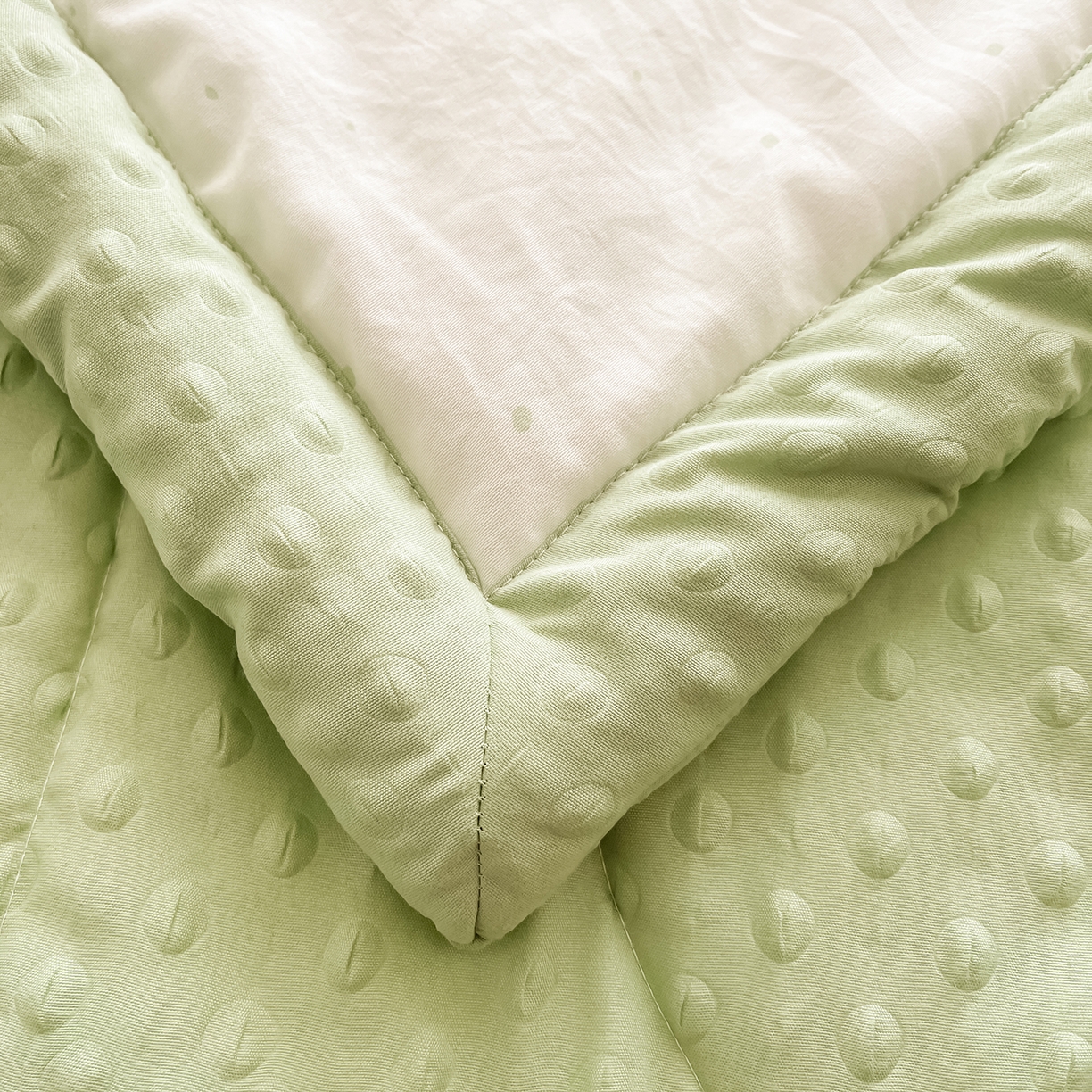 91家纺网 家纺一手货源 找家纺 悦织语 2026新款A类水洗棉双层纱豆豆被大豆夏凉被 快乐龙仔