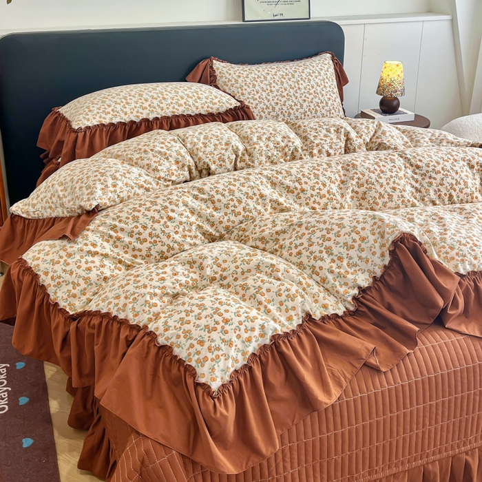91家纺网 家纺一手货源 找家纺 梦可莱家居 2026春夏新品法式复古大花边清新复古卡通系列床盖四件套 橙意满满