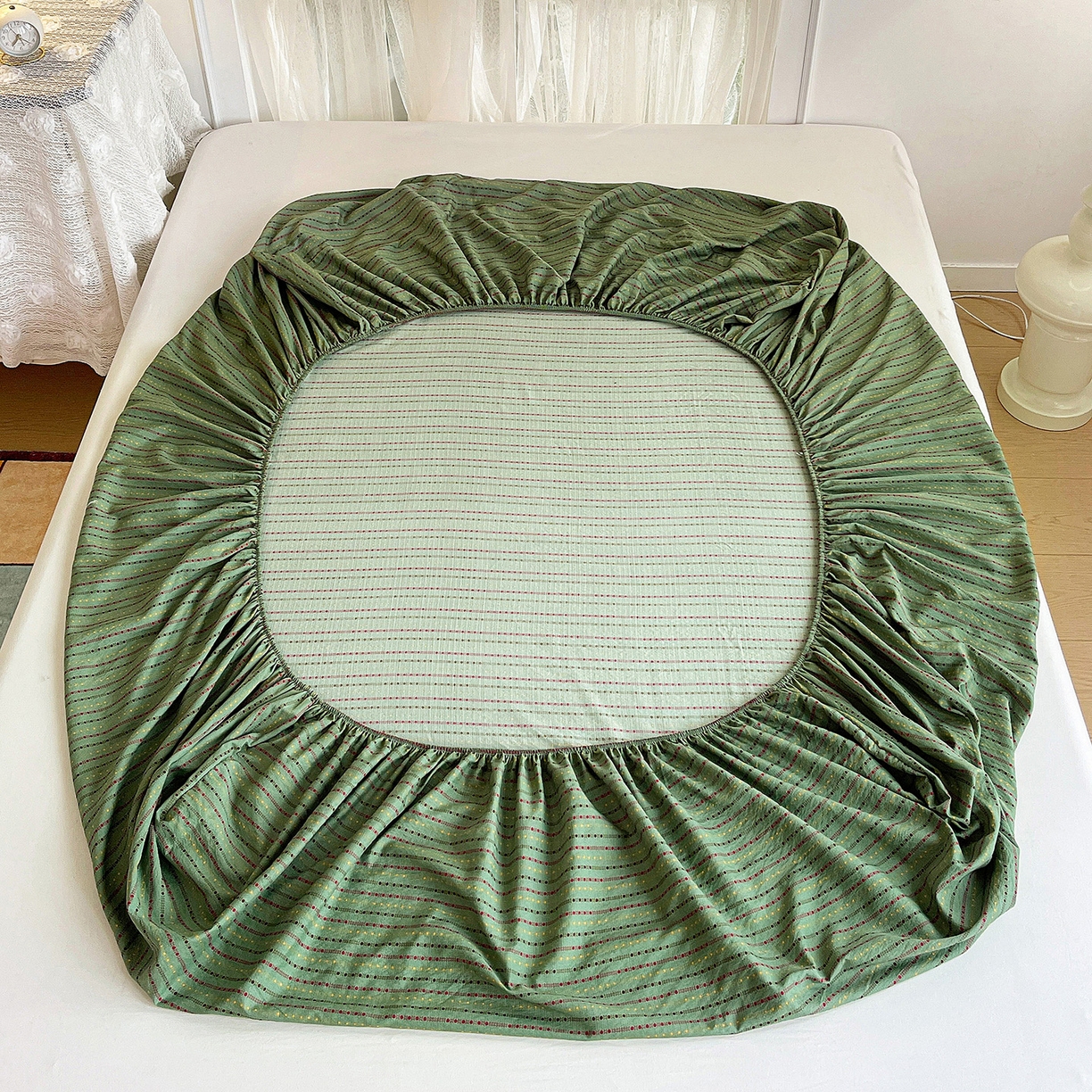 91家纺网 家纺一手货源 找家纺 纽缦家纺 2026春夏新款云感提花双层纱单床笠 床笠单件 六子棋-绿