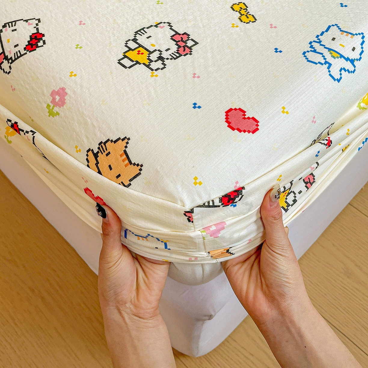 91家纺网 家纺一手货源 找家纺 纽缦家纺 2026春夏新款云感提花双层纱单床笠 床笠单件 像素小猫