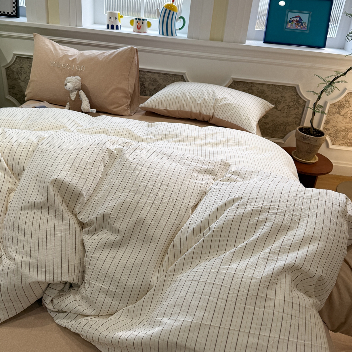 91家纺网 家纺一手货源 找家纺 曼町家居 2026春夏新款全棉纯棉色织水洗棉字母刺绣四件套 奶芙