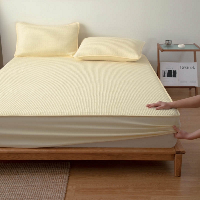 91家纺网 家纺一手货源 找家纺 宇淳国际 2026新款美人条A类水洗棉夹棉床笠三件套 奶黄