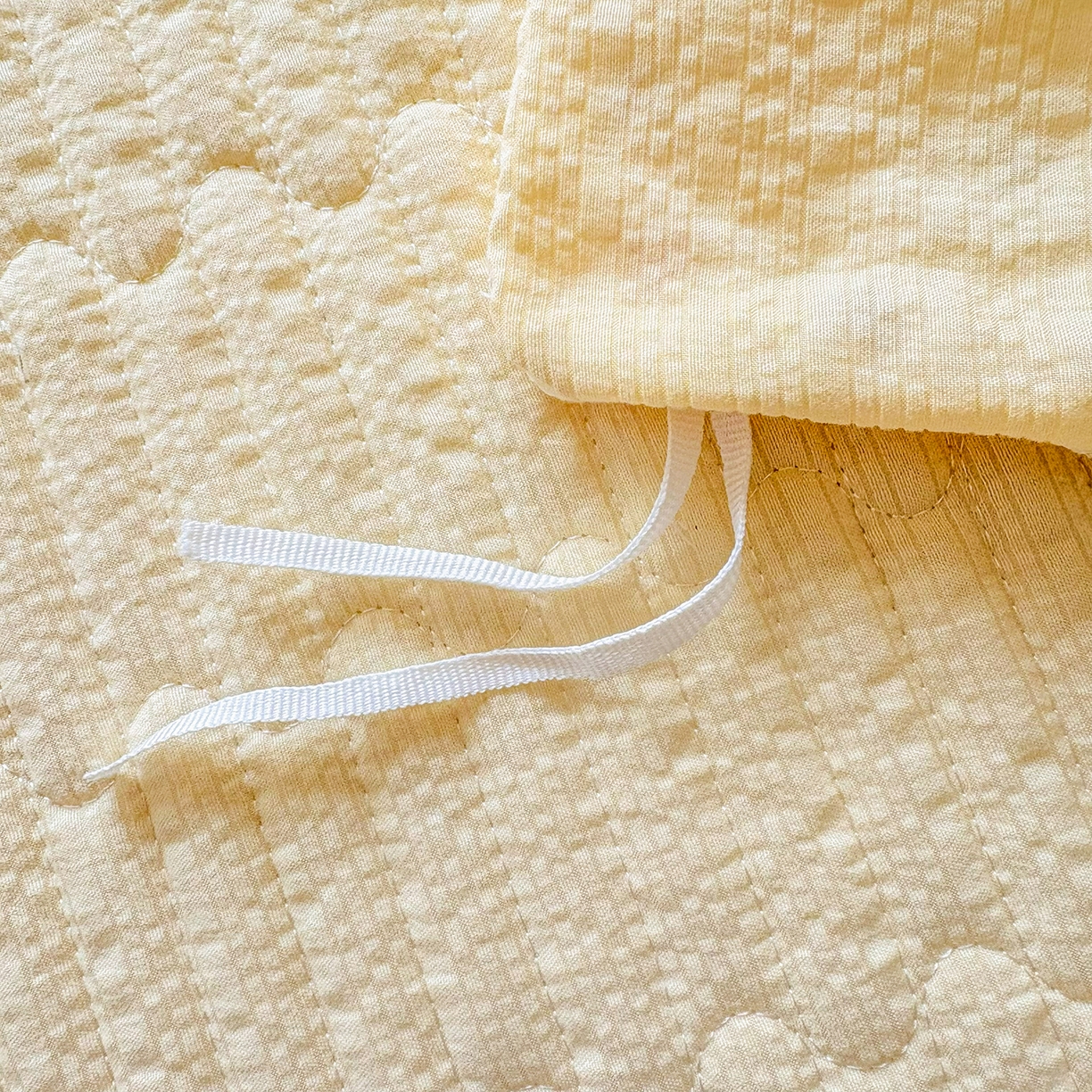 91家纺网 家纺一手货源 找家纺 民新家纺 2026新款泡芙双层纱床盖款四件套 心心相印