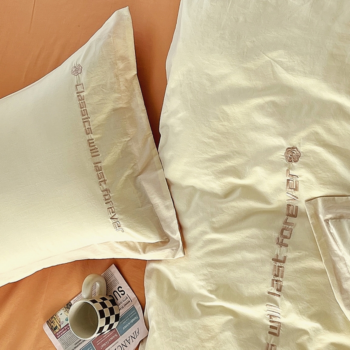 91家纺网 家纺一手货源 找家纺 拼社家纺 2026新款A类色织全棉水洗棉四件套纯棉四件套刺绣床上用品-漫系列 奶油白+香橙